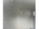 Clean and functional interior view of a storage shed with natural light, ready for organizing your tools at 3715 Sarasota Ct, Orlando, FL 32812