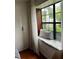 Stylish window seat with sheer curtains and a view at 3715 Sarasota Ct, Orlando, FL 32812