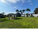 Community area with picnic shelter and mature trees at 4160 Pershing Pointe Pl # 1, Orlando, FL 32822