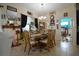 Elegant dining room with stylish table, decor, and tiled floor at 455 Cinnamon Dr, Kissimmee, FL 34759