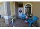 Inviting front porch with seating area and decorative accents at 455 Cinnamon Dr, Kissimmee, FL 34759