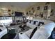 Comfortable living room featuring cozy seating, decorative elements, and a relaxing atmosphere at 455 Cinnamon Dr, Kissimmee, FL 34759