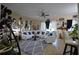 Cozy living room featuring stylish decor, comfortable seating, and ample natural light at 455 Cinnamon Dr, Kissimmee, FL 34759