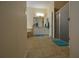Expansive main bathroom boasting dual vanities, a tub, and a separate glass enclosed shower at 455 Cinnamon Dr, Kissimmee, FL 34759