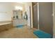 Spacious main bathroom features tile floors, dual sinks, soaking tub and separate shower at 455 Cinnamon Dr, Kissimmee, FL 34759