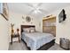 Nicely decorated bedroom with neutral tones, comfortable bed, and decorative wall accents at 4828 Jeanette Ct, St Cloud, FL 34771