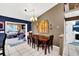 A dining room adjacent to a playroom and laundry room at 4828 Jeanette Ct, St Cloud, FL 34771