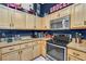 Bright kitchen with stainless steel oven and decorative accents at 4828 Jeanette Ct, St Cloud, FL 34771