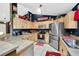 The kitchen features stainless steel appliances, ample counter space, and decorative accents at 4828 Jeanette Ct, St Cloud, FL 34771