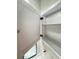 Bathroom cabinet featuring two shelves offering plenty of storage space at 5967 Village Cir # Ge, Orlando, FL 32822