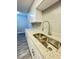 Modern kitchen with stainless steel sink and granite countertops at 5967 Village Cir # Ge, Orlando, FL 32822