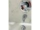 Close up of the shower head and the tub faucet at 5967 Village Cir # Ge, Orlando, FL 32822