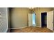 Bedroom featuring neutral walls, carpeted floors, window with blinds and door that leads to a walk-in closet at 6100 Stevenson Dr # 202, Orlando, FL 32835