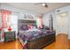 Charming primary bedroom with a London theme, featuring a comfortable bed and tasteful decor at 7912 Golden Pond Cir, Kissimmee, FL 34747