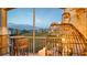 Balcony with comfortable chair and beautiful views of the surrounding neighborhood at 8103 Coconut Palm Way # 203, Kissimmee, FL 34747