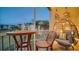 Balcony with outdoor seating and peaceful views of the community at 8103 Coconut Palm Way # 203, Kissimmee, FL 34747