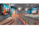 Spacious home theater with comfortable seating and a large movie screen for entertainment at 8103 Coconut Palm Way # 203, Kissimmee, FL 34747