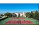 Active tennis courts with players and well-maintained landscape in a desirable neighborhood at 8103 Coconut Palm Way # 203, Kissimmee, FL 34747