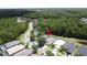 Neighborhood aerial view highlighting lush greenery, streetscape, and community amenities at 838 Sandy Ridge Dr, Davenport, FL 33896