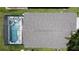 Aerial view of the pool and the roof of the property at 838 Sandy Ridge Dr, Davenport, FL 33896