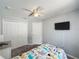 Bedroom featuring a ceiling fan and neutral walls at 838 Sandy Ridge Dr, Davenport, FL 33896