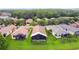 Aerial view of homes showing backyard, patio, and lake at 925 Grand Canal Dr, Poinciana, FL 34759