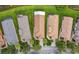 Aerial view of rooftops surrounded by green lawns at 925 Grand Canal Dr, Poinciana, FL 34759