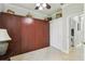 Interior view of a bedroom with a Murphy bed, baskets, and an open closet at 925 Grand Canal Dr, Poinciana, FL 34759