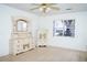 Bright bedroom featuring tiled floors and a matching bedroom furniture set at 926 Chula Ct, Lady Lake, FL 32159