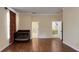 Bedroom with hardwood floors, natural light, and an ensuite bathroom and bonus room at 934 Westpark Dr, Celebration, FL 34747