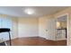 Bonus room features hardwood floors, trim, baseboards and an open door to an additional room at 934 Westpark Dr, Celebration, FL 34747