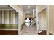 Elegant foyer featuring tile flooring, decorative trim, and staircase, seamlessly connecting to adjoining rooms at 934 Westpark Dr, Celebration, FL 34747