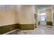 Bright foyer featuring decorative trim and tile flooring, connecting to adjoining rooms with French doors at 934 Westpark Dr, Celebration, FL 34747