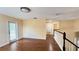 Spacious hallway with hardwood floors, access to the balcony, and plenty of natural light at 934 Westpark Dr, Celebration, FL 34747