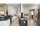 Gourmet kitchen with island, granite counters, stainless appliances and custom cabinetry at 934 Westpark Dr, Celebration, FL 34747