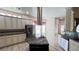 Spacious kitchen with granite countertops, stainless steel appliances, and tile flooring at 934 Westpark Dr, Celebration, FL 34747