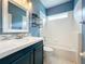 Bathroom featuring a vanity, bath tub and tile backsplash at 973 Corvina Dr, Davenport, FL 33897