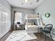 Charming bedroom featuring a bunk bed, desk, and stylish decor accents at 973 Corvina Dr, Davenport, FL 33897