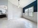 Bright dining room with a large window and tiled floors, open to other living spaces at 973 Corvina Dr, Davenport, FL 33897