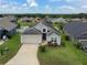 Charming single-story home with a well-manicured lawn, inviting entrance, and two-car garage in a lovely neighborhood at 973 Corvina Dr, Davenport, FL 33897