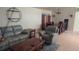 Spacious living room and dining area combination, perfect for gatherings, with ample seating and natural light at 117 Winchester Ln, Haines City, FL 33844