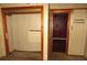 Bedroom with wood trim closet, and an adjoining wood trim doorway at 12019 Ne 212Th Street Rd, Fort Mc Coy, FL 32134