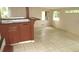Large living room featuring an entertainment area with small bar, with tile flooring at 12019 Ne 212Th Street Rd, Fort Mc Coy, FL 32134