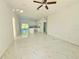Open living space with recessed lighting, ceiling fan, and bright, airy feel thanks to large windows at 1236 N Virginia Ave, Lakeland, FL 33805