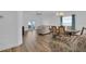 Open-concept living space combining living and dining areas for a seamless entertaining experience at 14287 E Weymouth Run, Orlando, FL 32828
