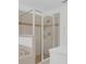 Modern shower boasts a glass enclosure, shower head, and sleek tile design at 14287 E Weymouth Run, Orlando, FL 32828