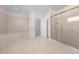 The bathroom features a separate soaking tub, large shower, and tiled floors at 1810 Lee Janzen Dr, Kissimmee, FL 34744