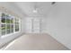 Clean and bright bedroom with a large window and built-in shelves at 1810 Lee Janzen Dr, Kissimmee, FL 34744