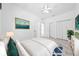 Well-lit bedroom featuring carpeting, large double closet, and contemporary furnishings at 1810 Lee Janzen Dr, Kissimmee, FL 34744