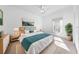 Bright bedroom featuring light wood furnishings and a cozy, inviting atmosphere at 1810 Lee Janzen Dr, Kissimmee, FL 34744